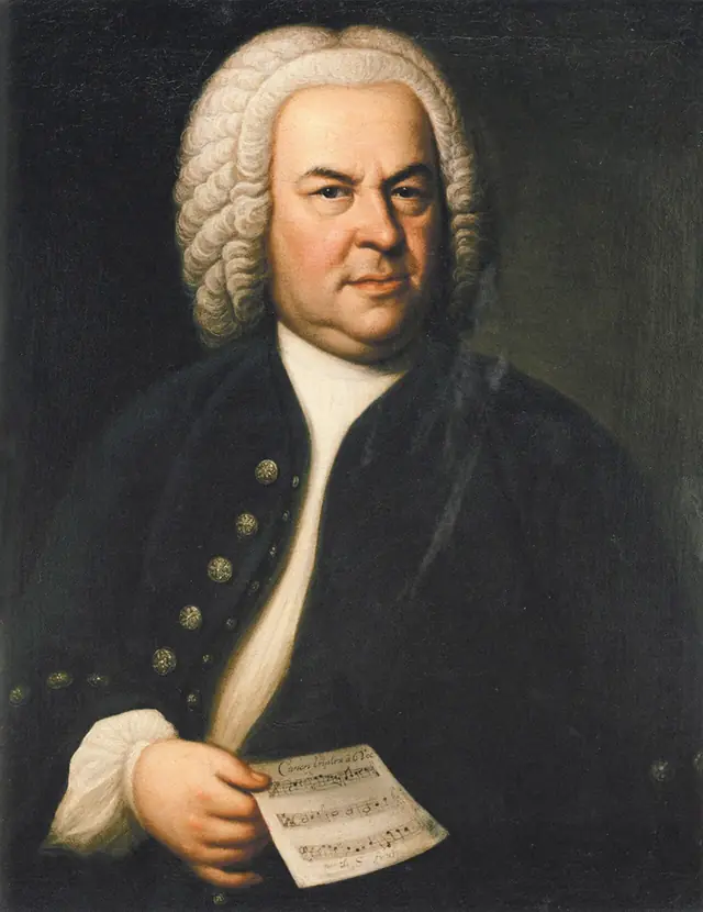 Elias Gottlob Haussmann, Johann Sebastian Bach, 1748 (2ª versão do retrato de 1746; Bach segura o cânone BWV 1076) · Domínio público (`File:Johann Sebastian Bach.jpg`).