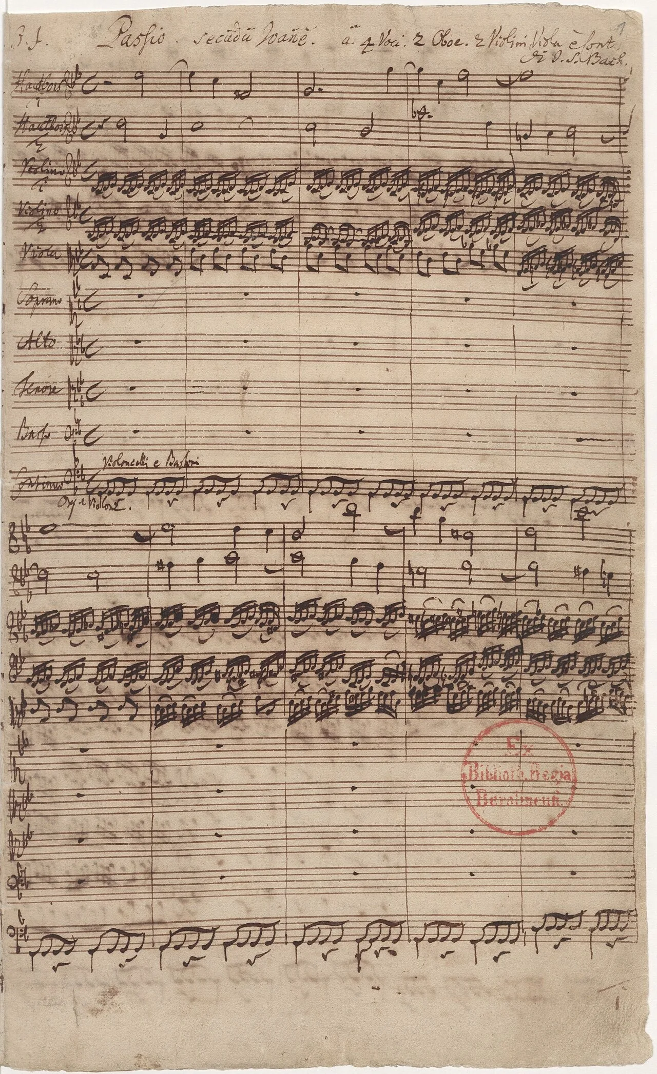 J. S. Bach, Paixão segundo João, BWV 245, autógrafo, 1ª página ("J. J. Passio secundum Joannem…") · Staatsbibliothek zu Berlin · Domínio público (`File:Johannespassion.jpg`).